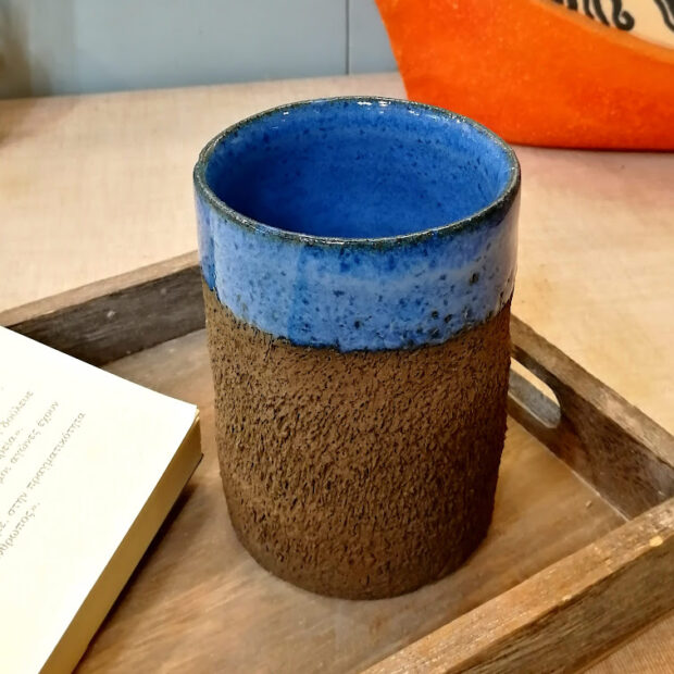 Ceramic handmade glass with embossed outer surface